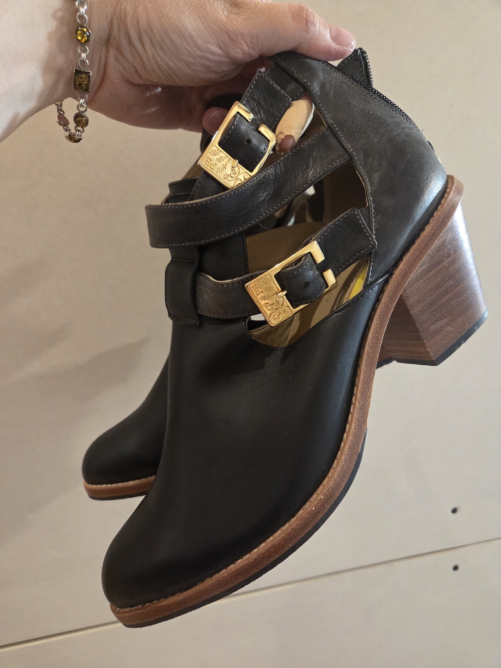 Poppy Barley Black Leather Heel Ankle Boots with Gold Buckles